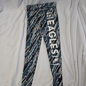 NFL Team Apparel Women's Teal and Black Leggings